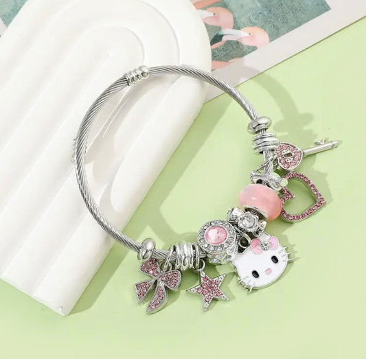 Bransoletka Hello Kitty – stop cynkowy, cyrkoniowa mozaika i urocze zawieszki